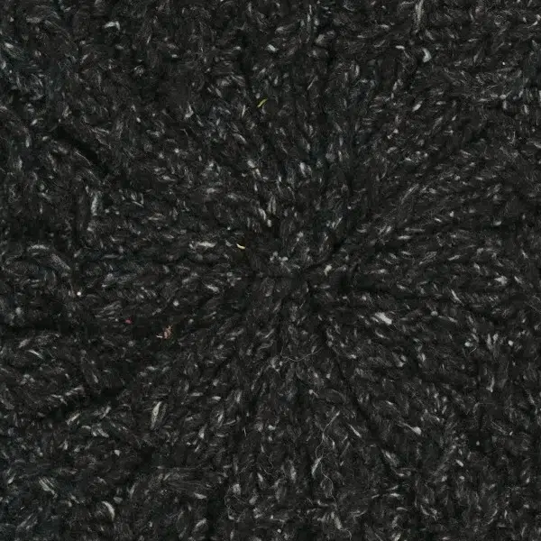 A close up of the fabric used for the winter beret, this is the black fabric