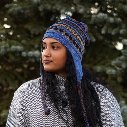 Young women wearing the blue hat outside