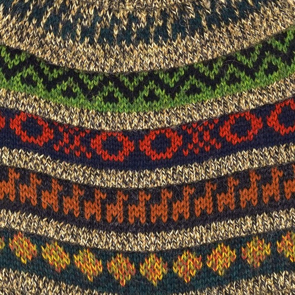 Close up of the brown hat, showing off the darkly colored designs