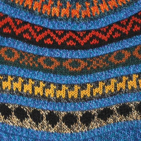 Close up of the light blue colored hat, showing the designs