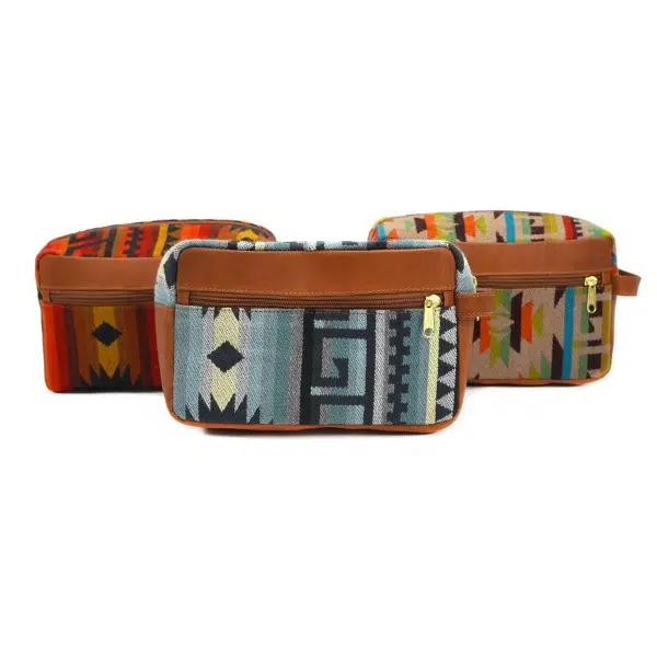 Large tan leather dopp kit bag with tribal patterns