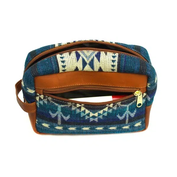 tan and blue tribal patter accent dopp kit bag with deodorant stick in front pocket