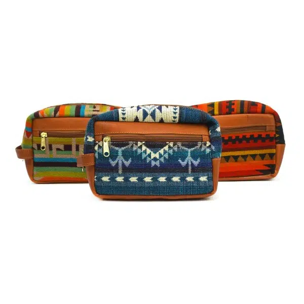 small tan leather dopp kit bags with tribal patters
