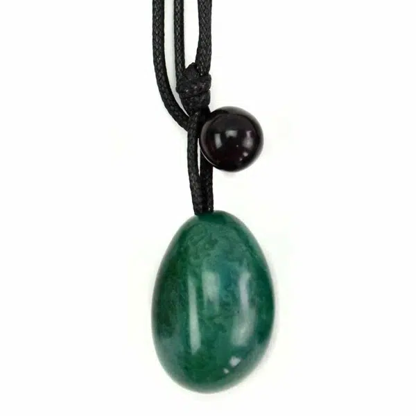 A close up picture of the green tagua seed necklace.