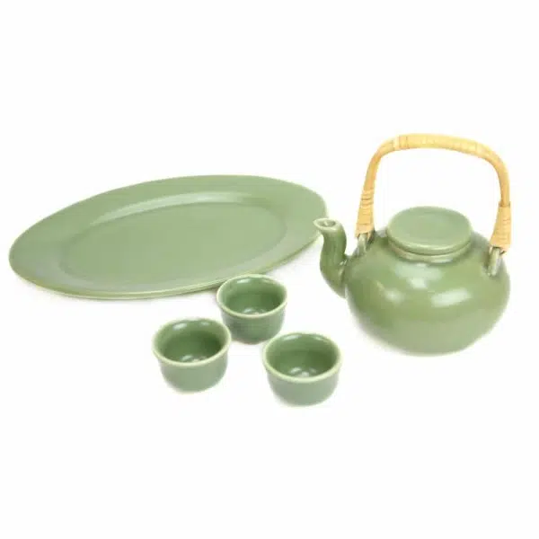 A green tea set, comes with cups, a plate, and a teapot