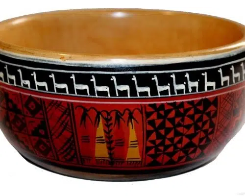 A wooden bowl meant for holding bread