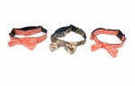 Three dog collars two of them are pink with a coral design on them, and one is brown that has a camo print