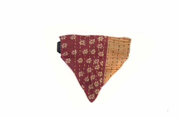 A small cat collar with a small kerchief attached to it, the kerchief color is maroon and dark yellow