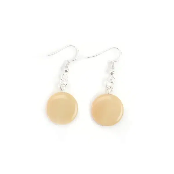 A close up picture of the white bubble earrings.