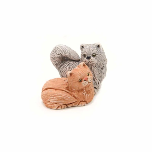 A close up of the cat ceramic mini duos