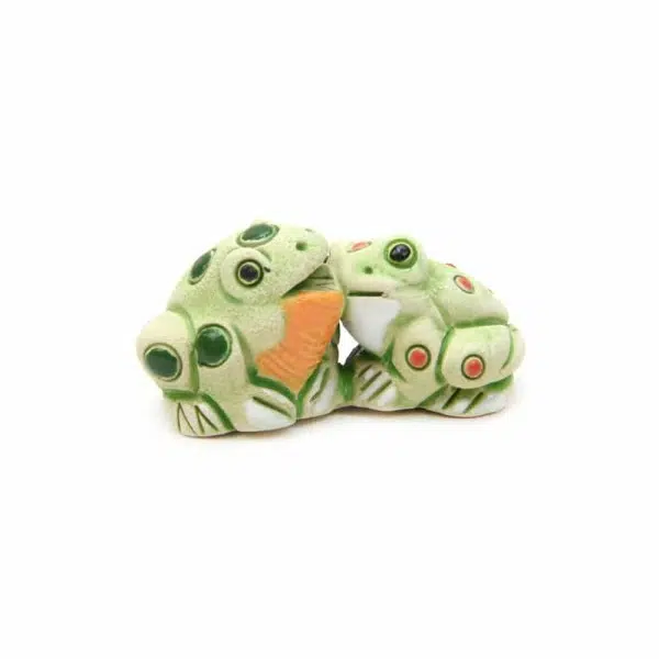 A close up of the frog ceramic mini duos