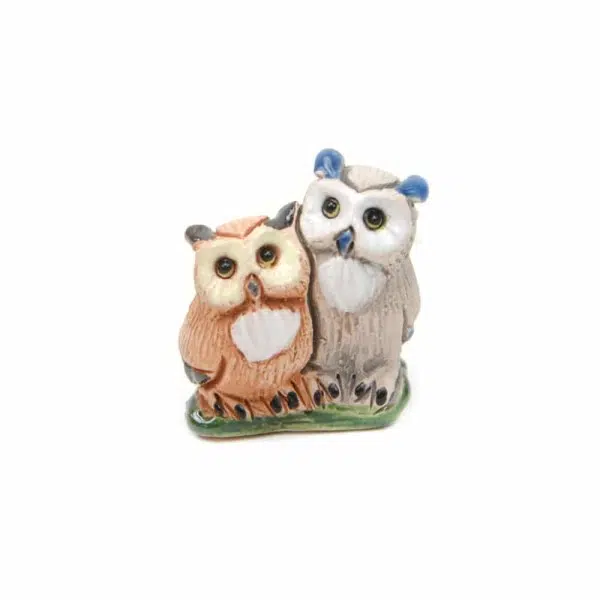 A close up of the owl ceramic mini duos