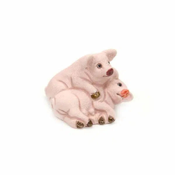 A close up of the pig ceramic mini duos