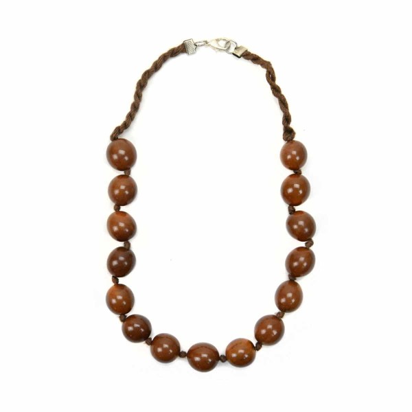Round tagua pearls on a cotton cord, this cotton and pearl set is brown.