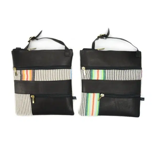 Black leather sling bag with stripe textile accents